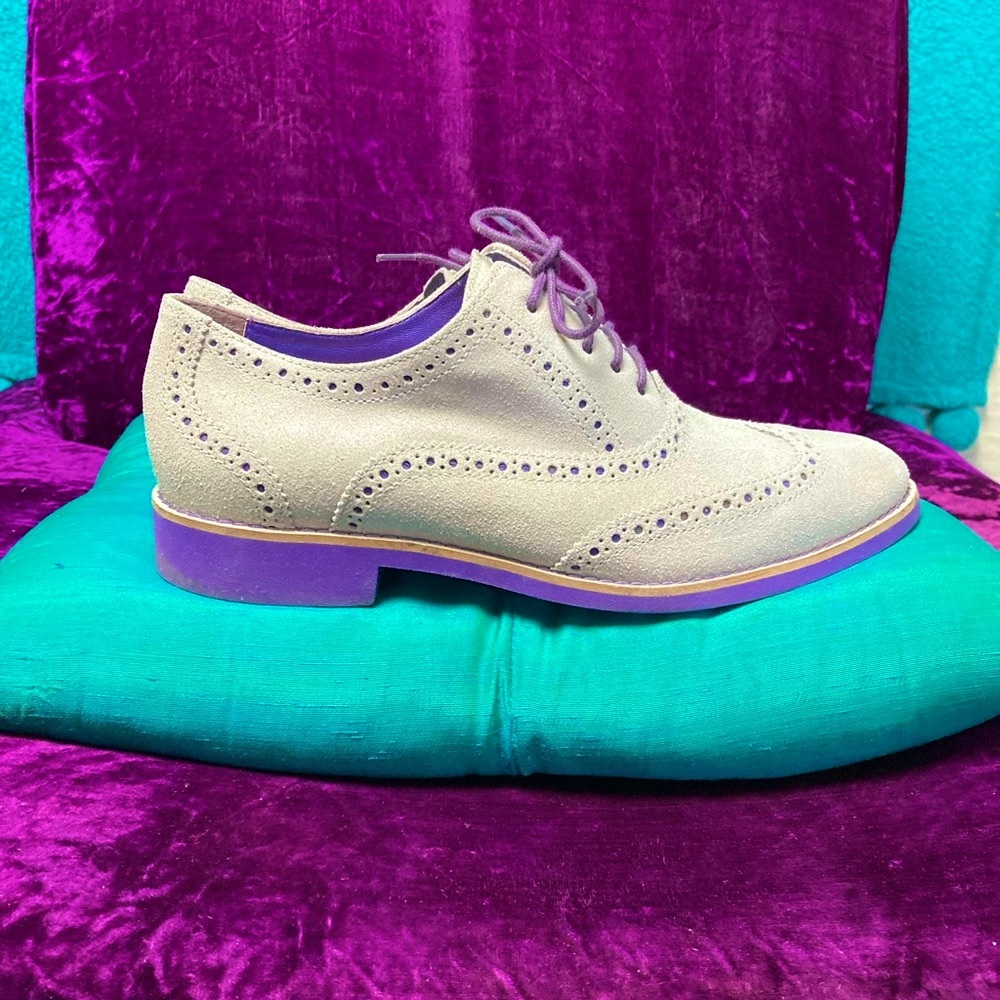 Cole Haan Light Gray Suede Wingtip Sneakers with Purple Sole.